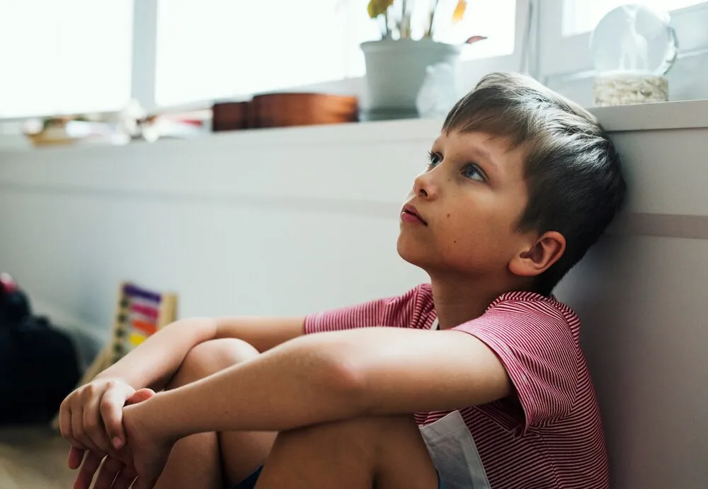 niño con depresión